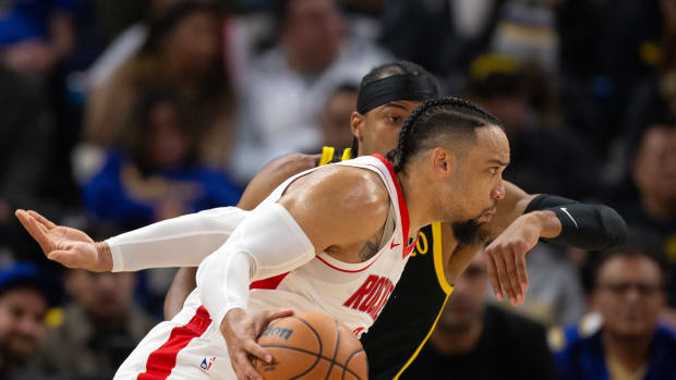 Rockets guard Dillon Brooks (9) drives around Golden State Warriors guard Moses Moody (4) during the first quarter at Chase Center.